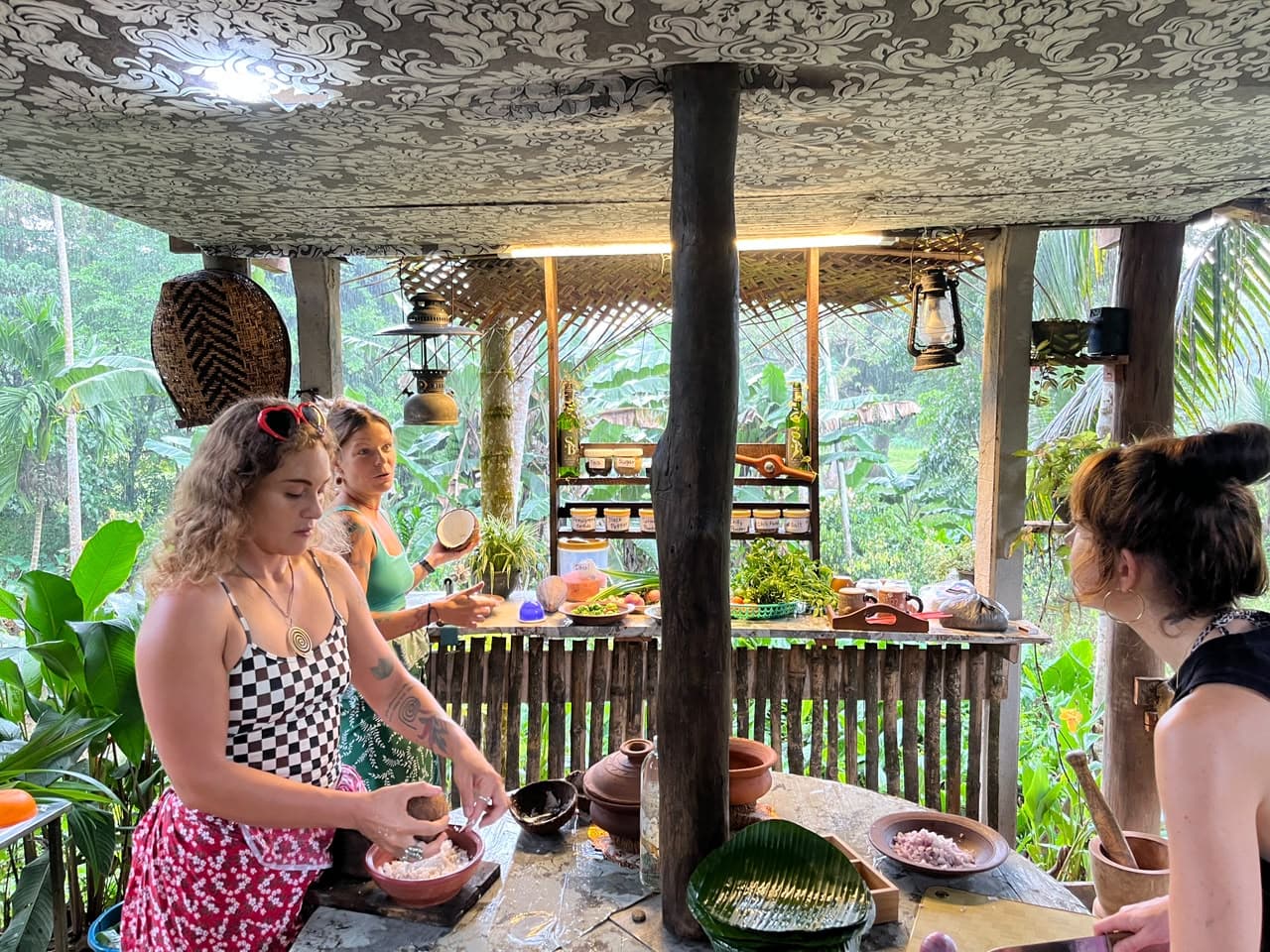 Guests cooking together at the Sigma House Nature Kitchen counter